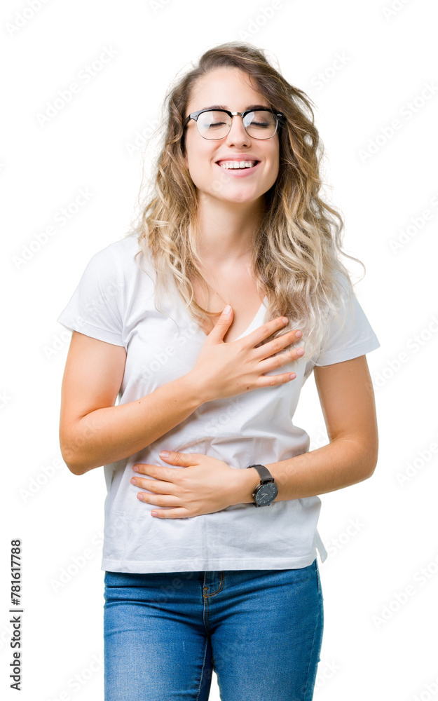 Beautiful young blonde woman wearing glasses over isolated background Smiling and laughing hard out loud because funny crazy joke. Happy expression. Beautiful young blonde woman wearing glasses over isolated background Smiling and laughing hard out loud because funny crazy joke. Happy expression.