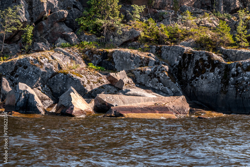 Lake Ladoga and rocky islands. Karelian forest, trees growing on rocks. Ladoga skerries. Nordic Scandinavian landscape photo