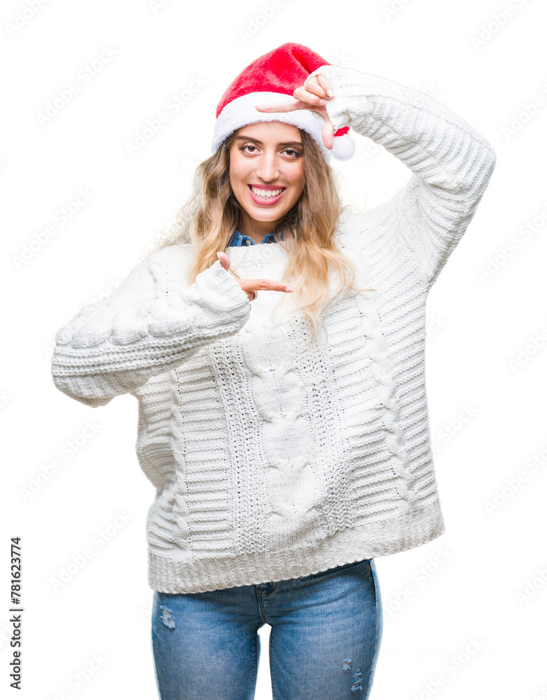 Beautiful young blonde woman wearing christmas hat over isolated background smiling making frame with hands and fingers with happy face. Creativity and photography concept. Beautiful young blonde woman wearing christmas hat over isolated background smiling making frame with hands and fingers with happy face. Creativity and photography concept.