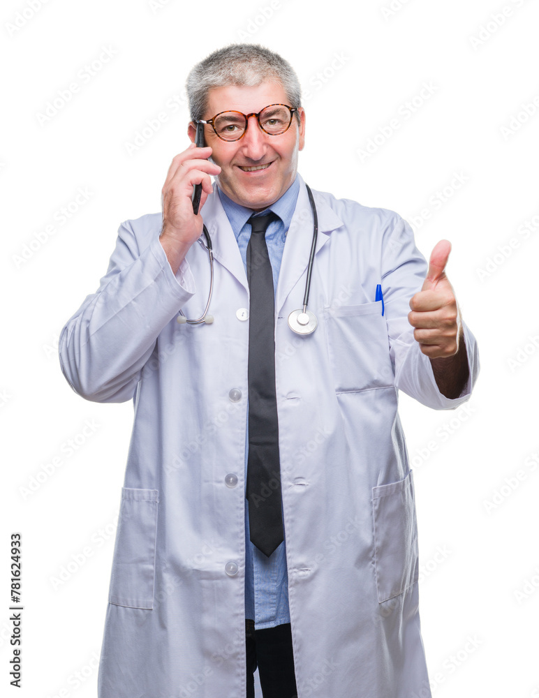 Handsome senior doctor man talking on smarpthone over isolated background happy with big smile doing ok sign, thumb up with fingers, excellent sign Handsome senior doctor man talking on smarpthone over isolated background happy with big smile doing ok sign, thumb up with fingers, excellent sign