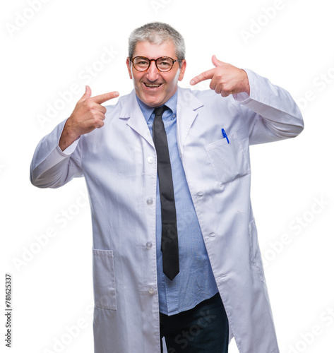 Handsome senior doctor, scientist professional man wearing white coat over isolated background smiling confident showing and pointing with fingers teeth and mouth. Health concept.