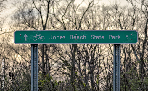 Jones Beach New York State Park 5 miles away sign at the entrance to the bike path on Wantagh, Long Island, New York.
