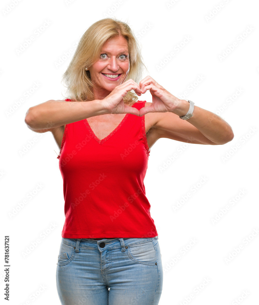 Middle age blonde woman over isolated background smiling in love showing heart symbol and shape with hands. Romantic concept. Middle age blonde woman over isolated background smiling in love showing heart symbol and shape with hands. Romantic concept.