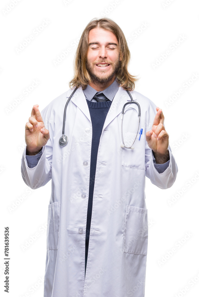 Young handsome doctor man with long hair over isolated background smiling crossing fingers with hope and eyes closed. Luck and superstitious concept. Young handsome doctor man with long hair over isolated background smiling crossing fingers with hope and eyes closed. Luck and superstitious concept.