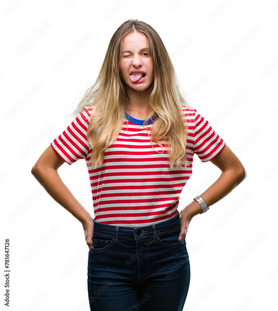 Fototapeta premium Young beautiful blonde woman over isolated background sticking tongue out happy with funny expression. Emotion concept.