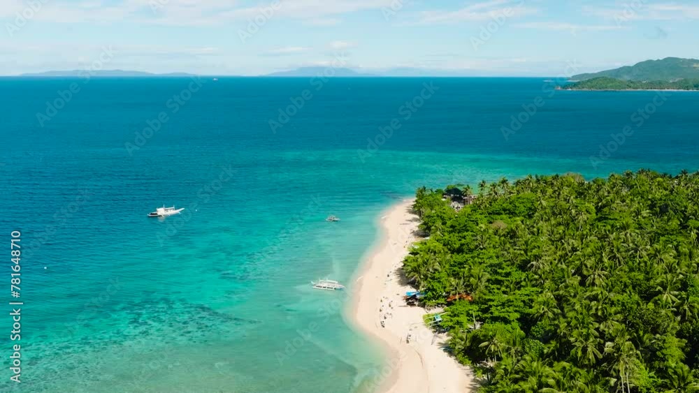 Drone view of white beach with clear sea water. Blue sky and clouds. Logbon Island. Romblon, Philippines. Drone view of white beach with clear sea water. Blue sky and clouds. Logbon Island. Romblon, Philippines.