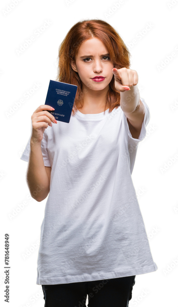 Young beautiful woman holding passport of germany over isolated background pointing with finger to the camera and to you, hand sign, positive and confident gesture from the front Young beautiful woman holding passport of germany over isolated background pointing with finger to the camera and to you, hand sign, positive and confident gesture from the front