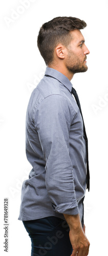 Young handsome business man over isolated background looking to side, relax profile pose with natural face with confident smile.