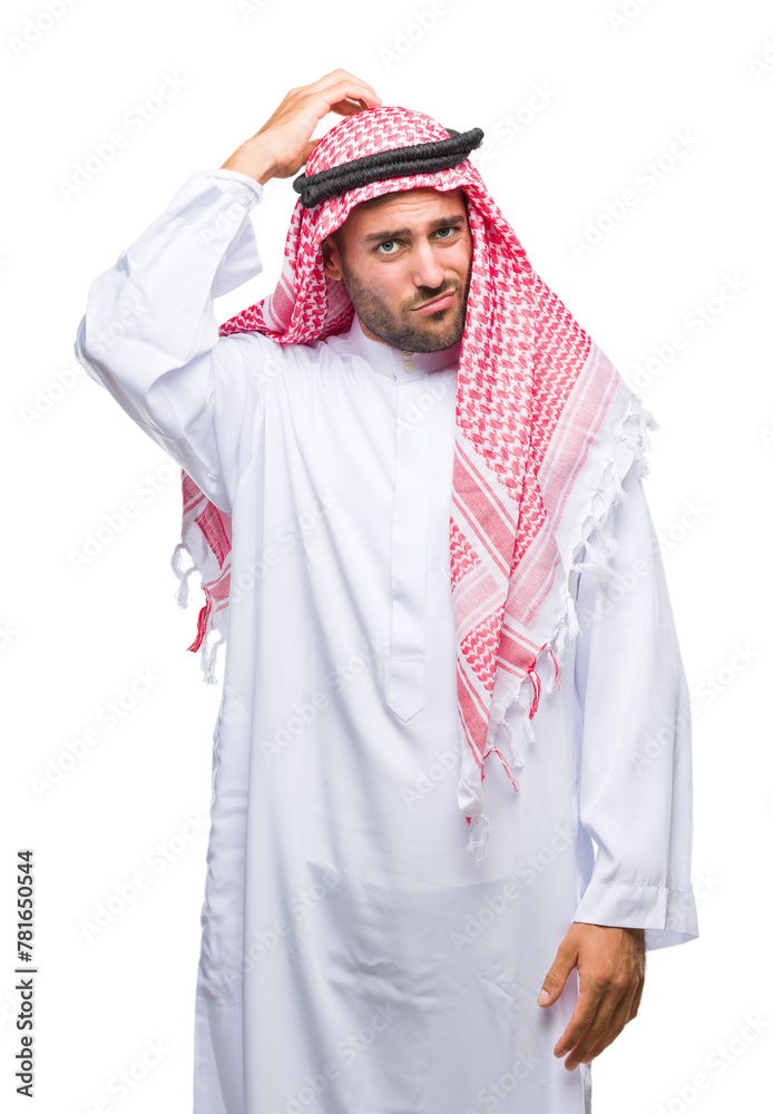 Young handsome man wearing keffiyeh over isolated background confuse and wonder about question. Uncertain with doubt, thinking with hand on head. Pensive concept.