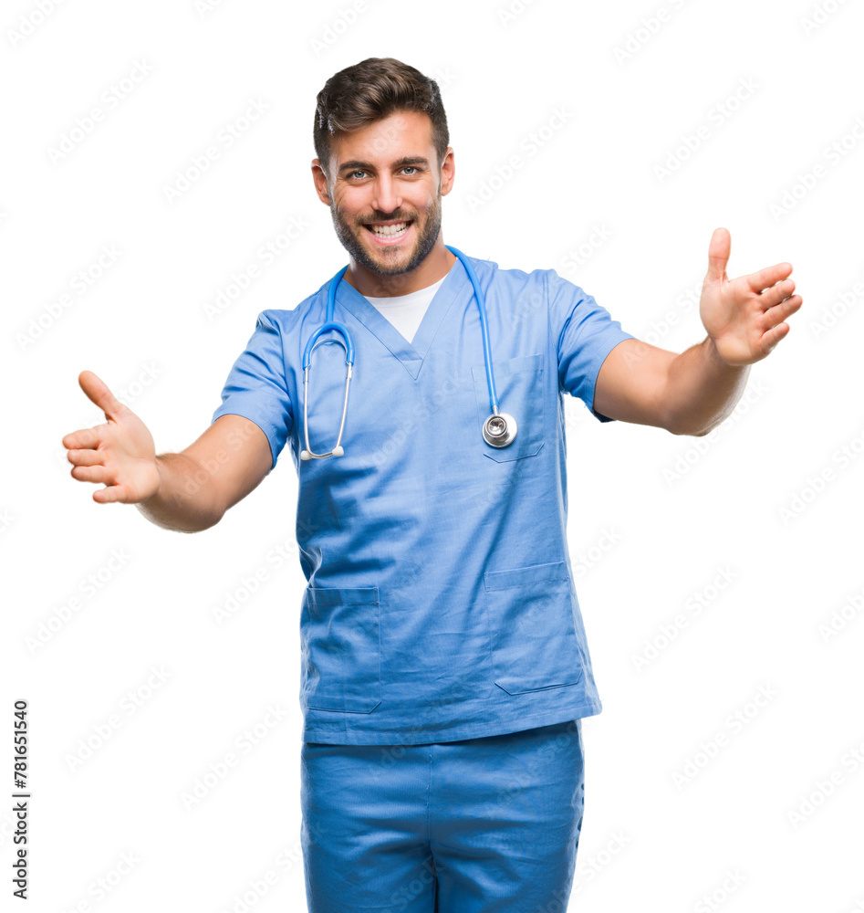 Young handsome doctor surgeon man over isolated background looking at the camera smiling with open arms for hug. Cheerful expression embracing happiness. Young handsome doctor surgeon man over isolated background looking at the camera smiling with open arms for hug. Cheerful expression embracing happiness.