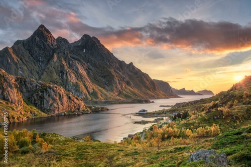 Sunset over the autumnal Stone Fjord, in the background the Nordic Sea and the summit massif of Himmelstindan, Lofoten, Nordland, Norway, Europe photo