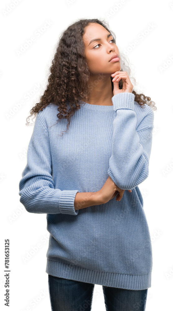 Beautiful young hispanic woman serious face thinking about question, very confused idea Beautiful young hispanic woman serious face thinking about question, very confused idea
