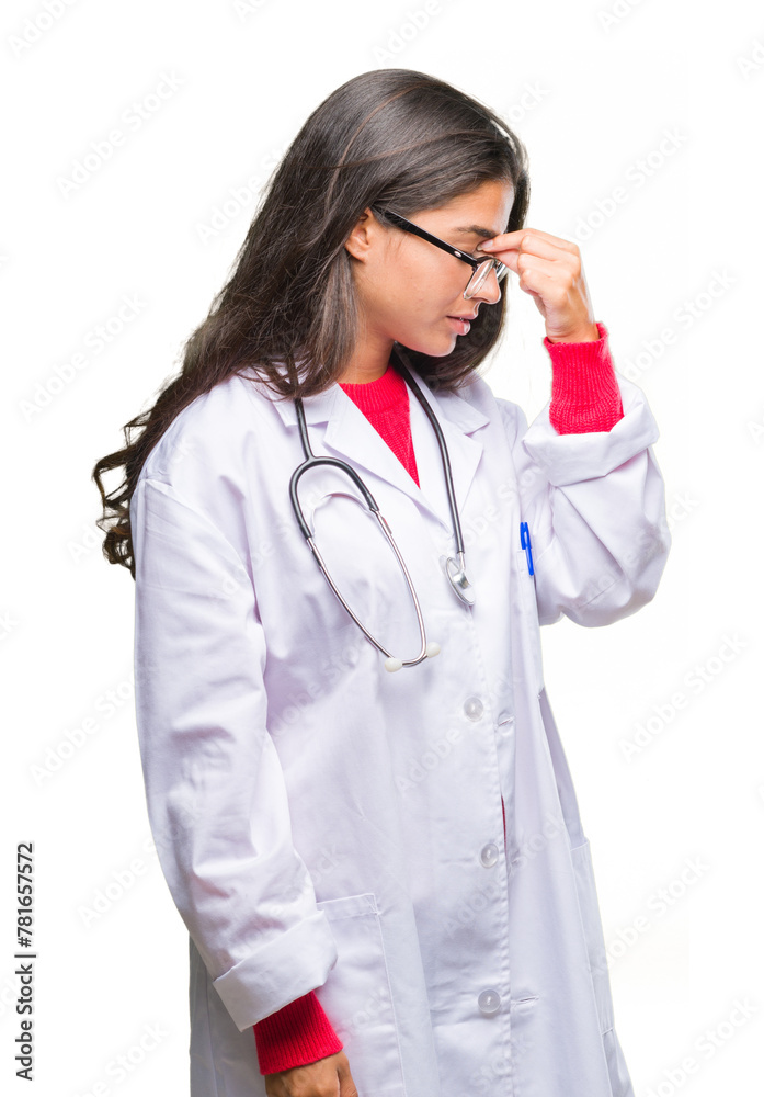 Young arab doctor woman over isolated background tired rubbing nose and eyes feeling fatigue and headache. Stress and frustration concept. Young arab doctor woman over isolated background tired rubbing nose and eyes feeling fatigue and headache. Stress and frustration concept.