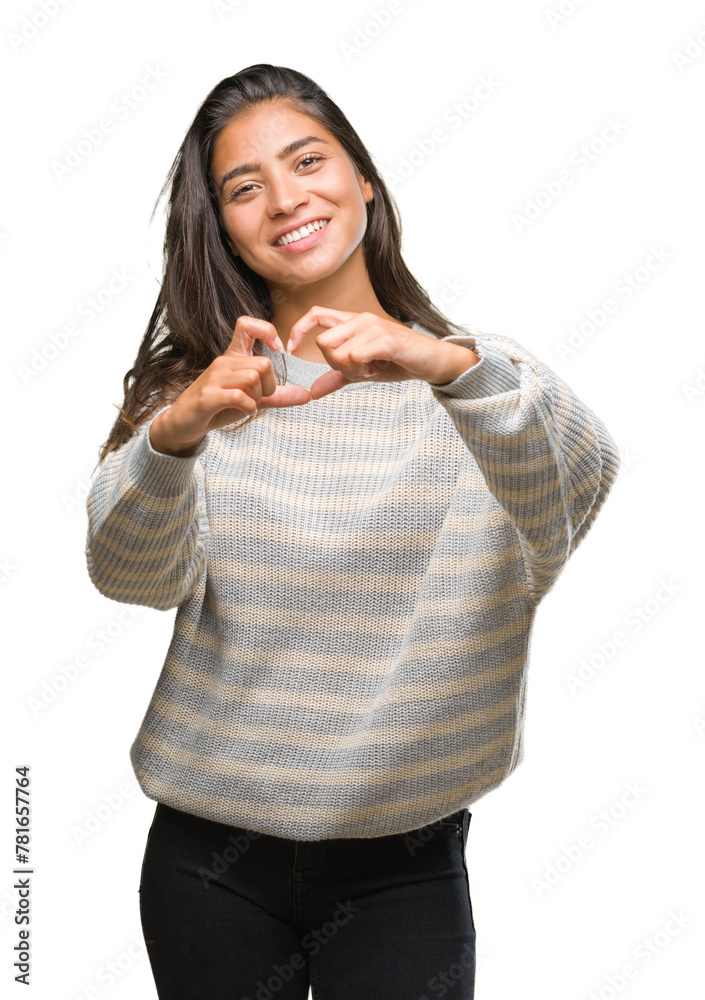 Young beautiful arab woman wearing winter sweater over isolated background smiling in love showing heart symbol and shape with hands. Romantic concept. Young beautiful arab woman wearing winter sweater over isolated background smiling in love showing heart symbol and shape with hands. Romantic concept.