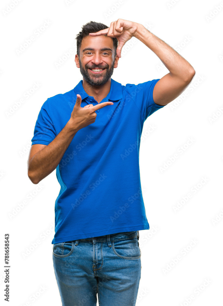 Fototapeta premium Adult hispanic man over isolated background smiling making frame with hands and fingers with happy face. Creativity and photography concept.