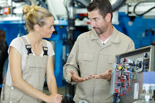 male and female mechanics in discussion