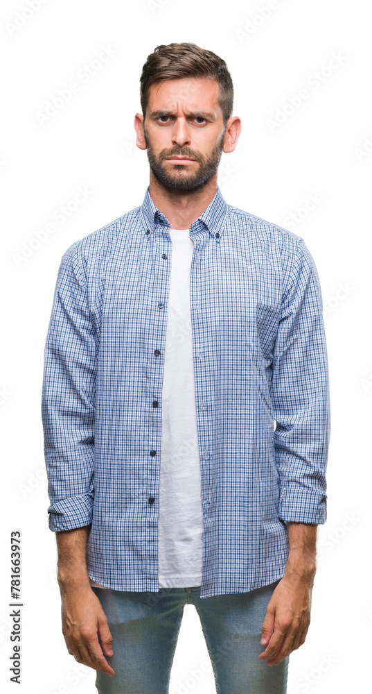 © Krakenimages.com - Young handsome man wearing white t-shirt over isolated background skeptic and nervous, frowning upset because of problem. Negative person.
