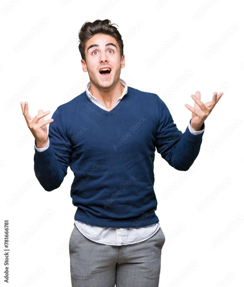 Fototapeta premium Young handsome business man over isolated background crazy and mad shouting and yelling with aggressive expression and arms raised. Frustration concept.