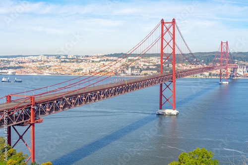 25 de Abril bridge, or Salazar bridge seen from Almada to Lisbon-Portugal. photo