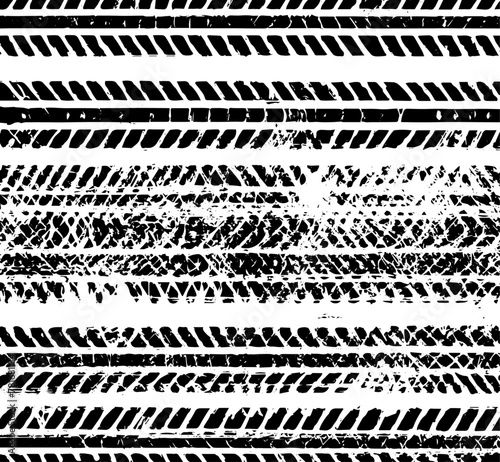 black and white seamless pattern of repeating tire tracks, texture background