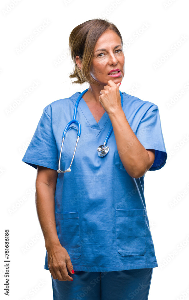 Middle age senior nurse doctor woman over isolated background looking confident at the camera with smile with crossed arms and hand raised on chin. Thinking positive. Middle age senior nurse doctor woman over isolated background looking confident at the camera with smile with crossed arms and hand raised on chin. Thinking positive.