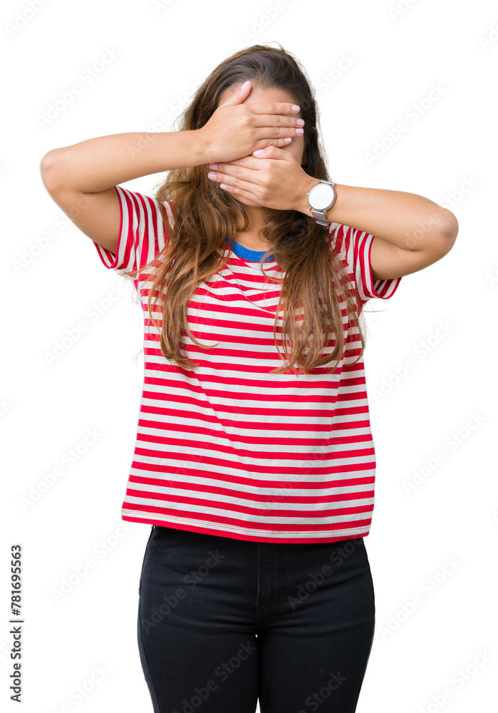 Young beautiful brunette woman wearing stripes t-shirt over isolated background Covering eyes and mouth with hands, surprised and shocked. Hiding emotion Young beautiful brunette woman wearing stripes t-shirt over isolated background Covering eyes and mouth with hands, surprised and shocked. Hiding emotion