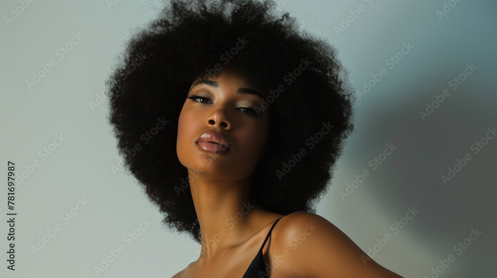 A striking black woman with a bold angular afro and vitiligo gracefully wears a sleek highfashion dress. With a hand on her hip and a fierce gaze she challenges societal beauty standards . A striking black woman with a bold angular afro and vitiligo gracefully wears a sleek highfashion dress. With a hand on her hip and a fierce gaze she challenges societal beauty standards .