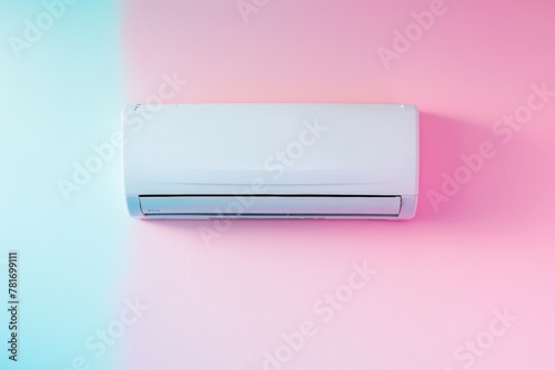 A white air conditioner is mounted on pink wall. Summer heat concept © Space Priest