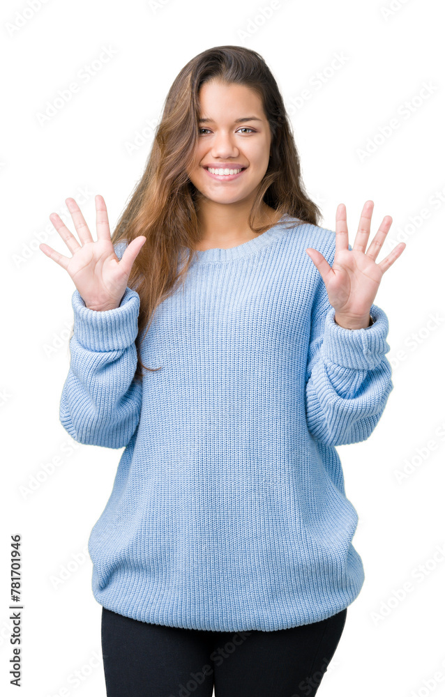 Young beautiful brunette woman wearing blue winter sweater over isolated background showing and pointing up with fingers number ten while smiling confident and happy. Young beautiful brunette woman wearing blue winter sweater over isolated background showing and pointing up with fingers number ten while smiling confident and happy.