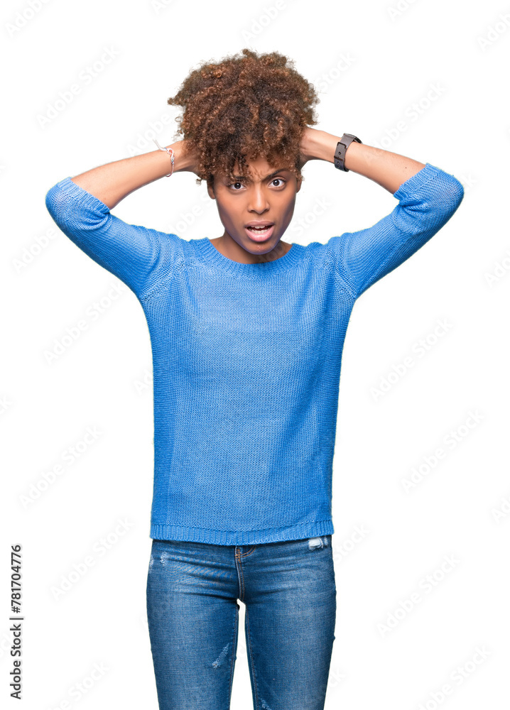 Beautiful young african american woman over isolated background Crazy and scared with hands on head, afraid and surprised of shock with open mouth Beautiful young african american woman over isolated background Crazy and scared with hands on head, afraid and surprised of shock with open mouth