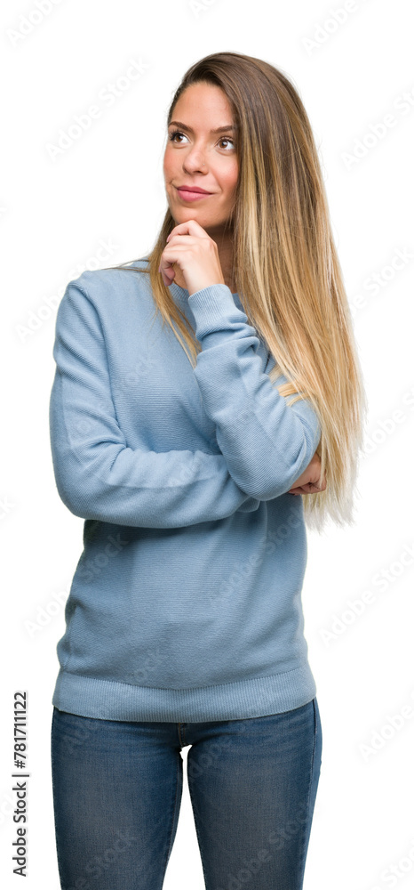 Beautiful young woman wearing sweater and jeans serious face thinking about question, very confused idea