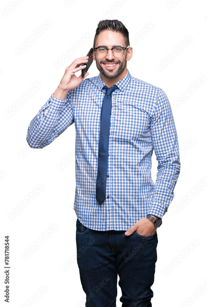 Young business man talking on the phone over isolated background with a happy face standing and smiling with a confident smile showing teeth Young business man talking on the phone over isolated background with a happy face standing and smiling with a confident smile showing teeth