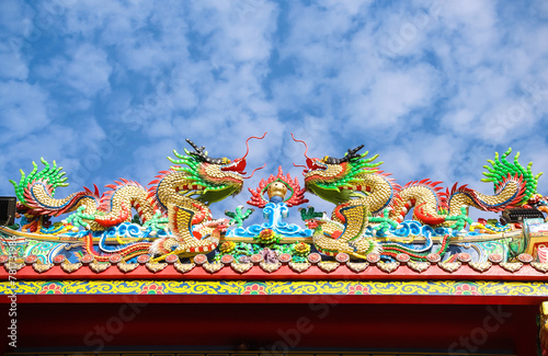 Dragon two on blue sky clouds pattern summer background and space