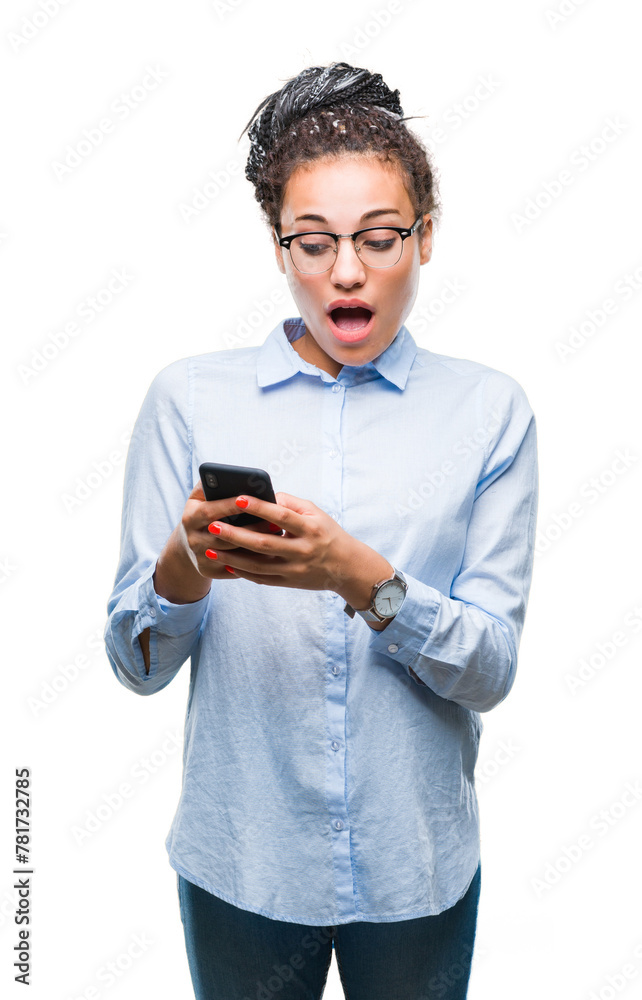 Young braided hair african american business girl using smartphone over isolated background scared in shock with a surprise face, afraid and excited with fear expression
