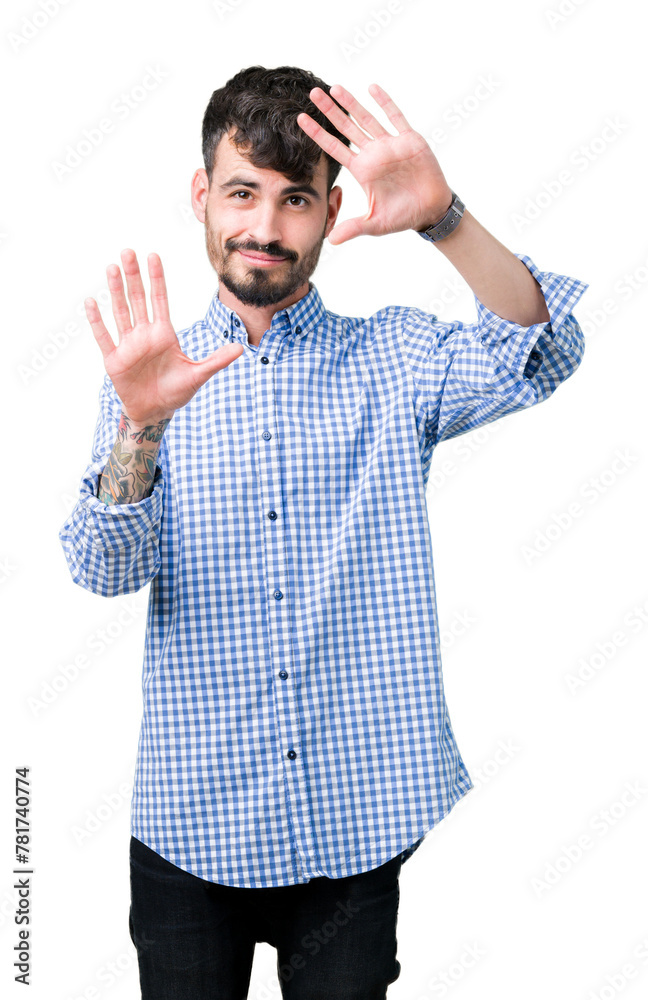 Young handsome business man over isolated background Smiling doing frame using hands palms and fingers, camera perspective Young handsome business man over isolated background Smiling doing frame using hands palms and fingers, camera perspective