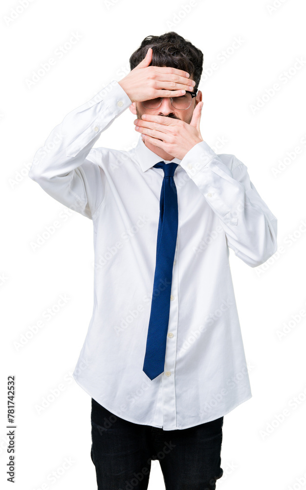 Young handsome business man wearing glasses over isolated background Covering eyes and mouth with hands, surprised and shocked. Hiding emotion Young handsome business man wearing glasses over isolated background Covering eyes and mouth with hands, surprised and shocked. Hiding emotion