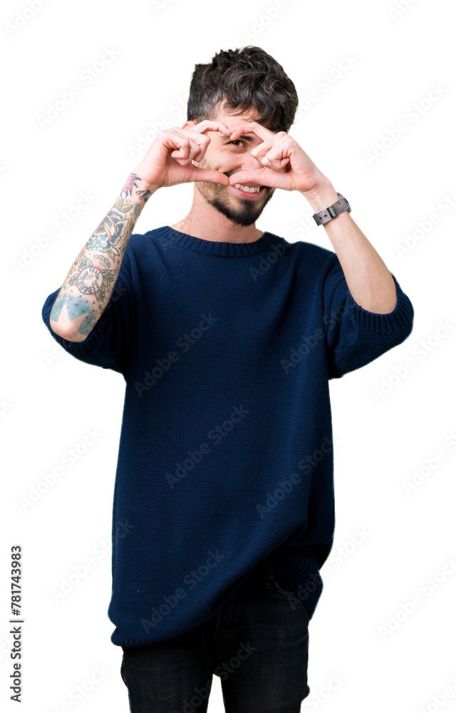 Young handsome man over isolated background Doing heart shape with hand and fingers smiling looking through sign Young handsome man over isolated background Doing heart shape with hand and fingers smiling looking through sign