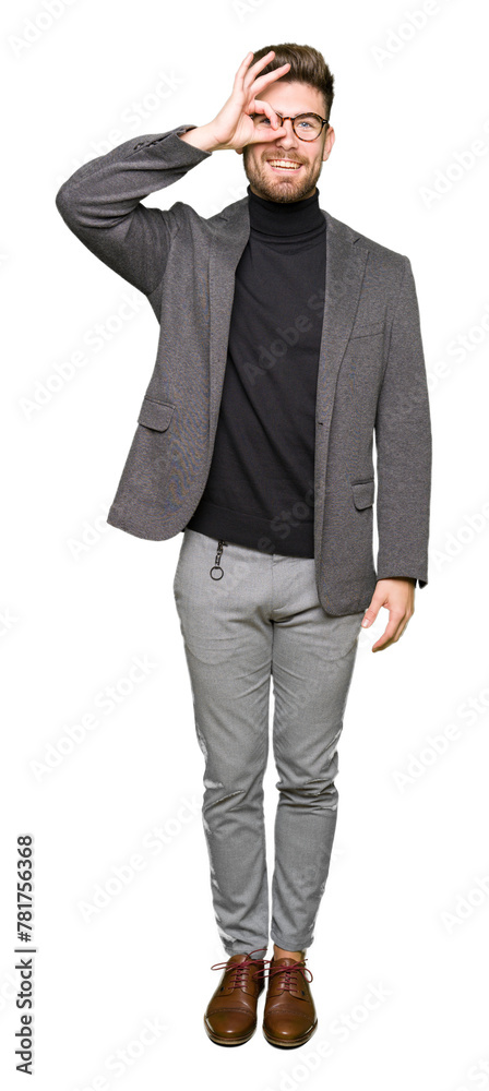Young handsome business man wearing glasses doing ok gesture with hand smiling, eye looking through fingers with happy face. Young handsome business man wearing glasses doing ok gesture with hand smiling, eye looking through fingers with happy face.