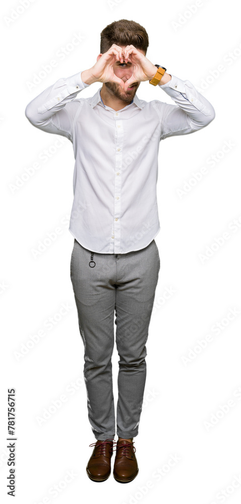 Young handsome business man Doing heart shape with hand and fingers smiling looking through sign Young handsome business man Doing heart shape with hand and fingers smiling looking through sign