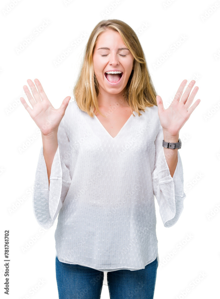 Beautiful young elegant woman over isolated background celebrating mad and crazy for success with arms raised and closed eyes screaming excited. Winner concept Beautiful young elegant woman over isolated background celebrating mad and crazy for success with arms raised and closed eyes screaming excited. Winner concept