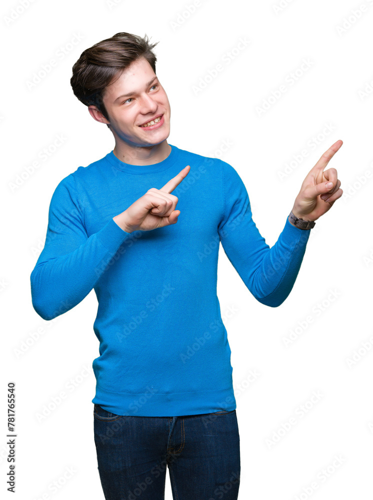 Young handsome man wearing blue sweater over isolated background smiling and looking at the camera pointing with two hands and fingers to the side. Young handsome man wearing blue sweater over isolated background smiling and looking at the camera pointing with two hands and fingers to the side.