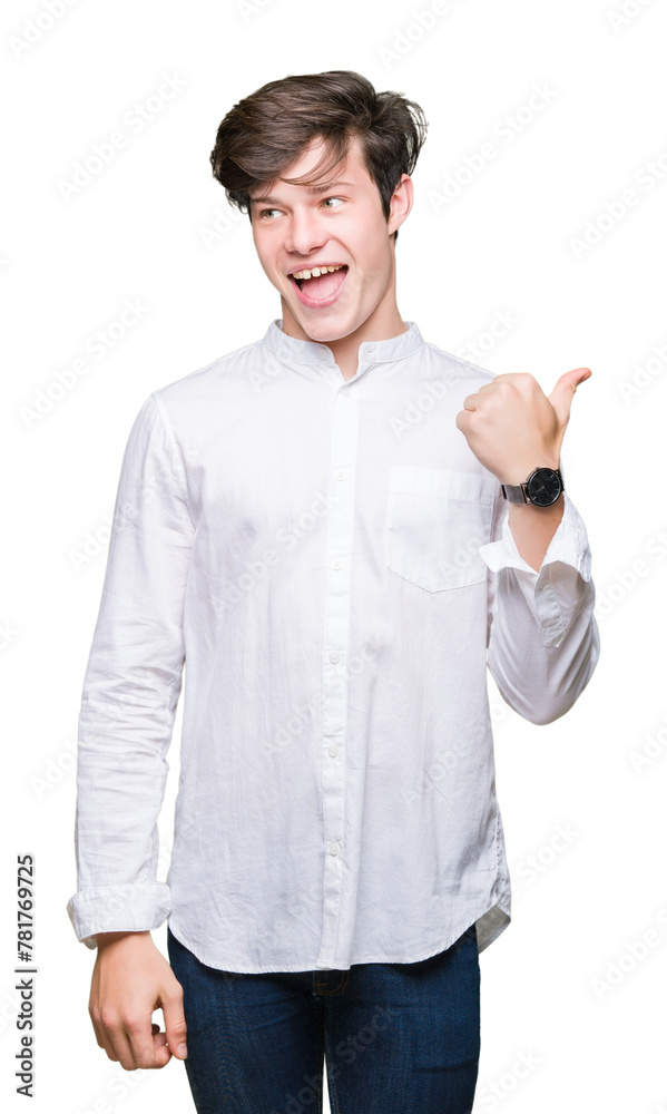Young handsome business man over isolated background smiling with happy face looking and pointing to the side with thumb up. Young handsome business man over isolated background smiling with happy face looking and pointing to the side with thumb up.