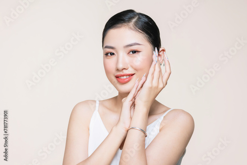 Obraz na płótnie Young beautiful woman skin care concept portrait with hand touching skin face w salonie