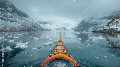 A traditional Inuit kayak gliding gracefully through the icy waters of Greenland's fjords. photo