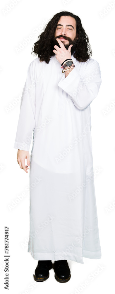 Man wearing Jesus Christ costume looking confident at the camera with smile with crossed arms and hand raised on chin. Thinking positive. Man wearing Jesus Christ costume looking confident at the camera with smile with crossed arms and hand raised on chin. Thinking positive.