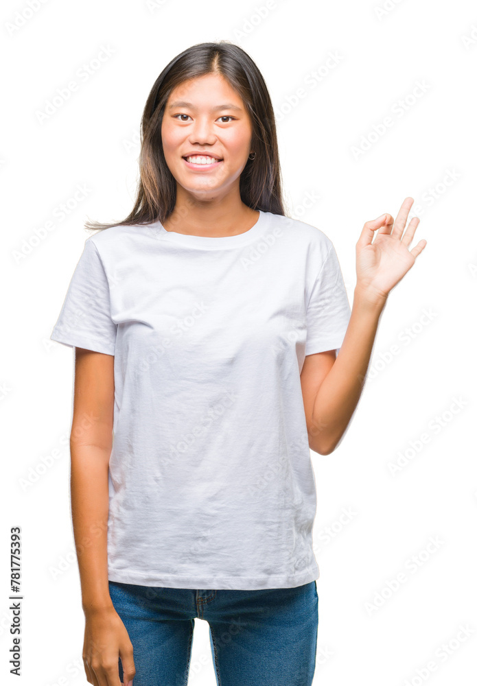 Young asian woman over isolated background smiling positive doing ok sign with hand and fingers. Successful expression. Young asian woman over isolated background smiling positive doing ok sign with hand and fingers. Successful expression.