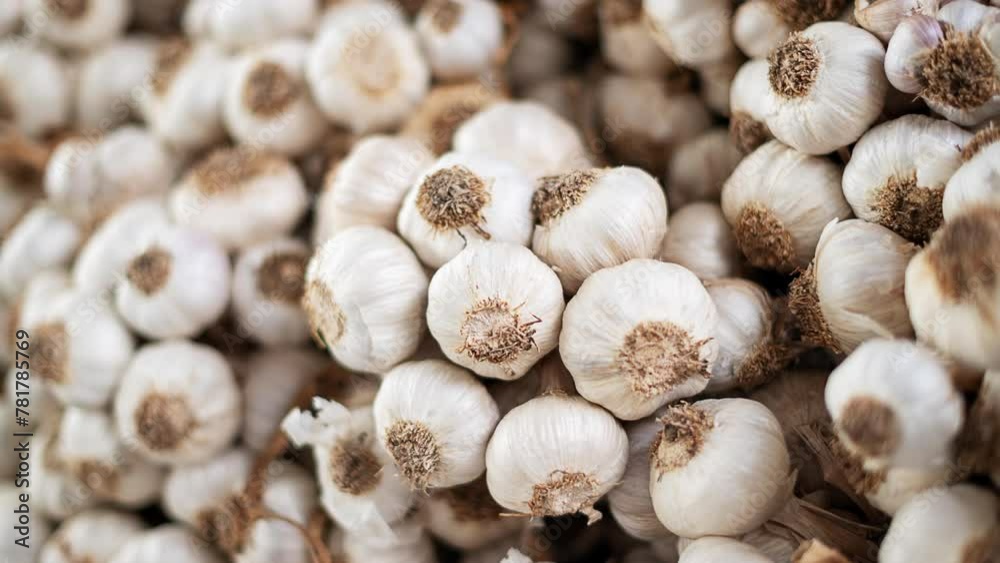 a lot of garlic in the local market, spices, vegetarian life, healthy diet, view from the above a lot of garlic in the local market, spices, vegetarian life, healthy diet, view from the above