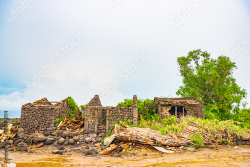 Stone houses and stone piles in the ancient salt fields of Yanding, Danzhou, Hainan, China photo