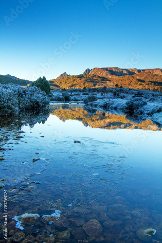 Sunrise from Ronny Creek looking towards Cradle Mountain with a heavy Frost, Cradle Mountain National Park, Tasmania, Australia photo