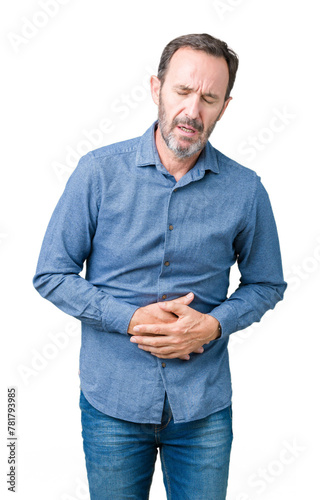 Handsome middle age elegant senior man over isolated background with hand on stomach because indigestion, painful illness feeling unwell. Ache concept. © Krakenimages.com